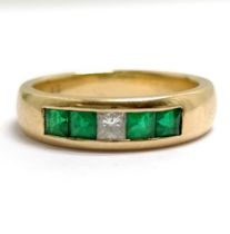 18ct marked gold emerald (0.5 cts) & diamond (0.13 ct) set band ring - size P & 6.6g total weight
