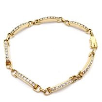 18ct hallmarked gold bracelet channel set with 49 diamonds - 18cm long & 11.8g total weight