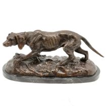 Large contemporary bronze figure of a hunting dog on a black marble base - 40cm long x 19cm high