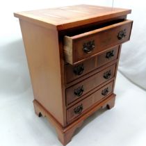 Small reproduction 4 drawer chest 45cm wide x 63cm high x 33cm deep - some marks to the top