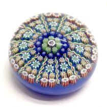 Perthshire paperweight with central cane, 2 concentric rings & 12 radial twists separating cane