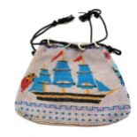 Antique Berlin beadwork purse depicting tall masted ship & has drawstring to top (with mother of