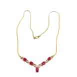 9ct marked gold ruby / diamond necklet (44cm long & 4.5g total weight) in original retail box