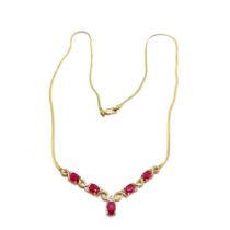 9ct marked gold ruby / diamond necklet (44cm long & 4.5g total weight) in original retail box
