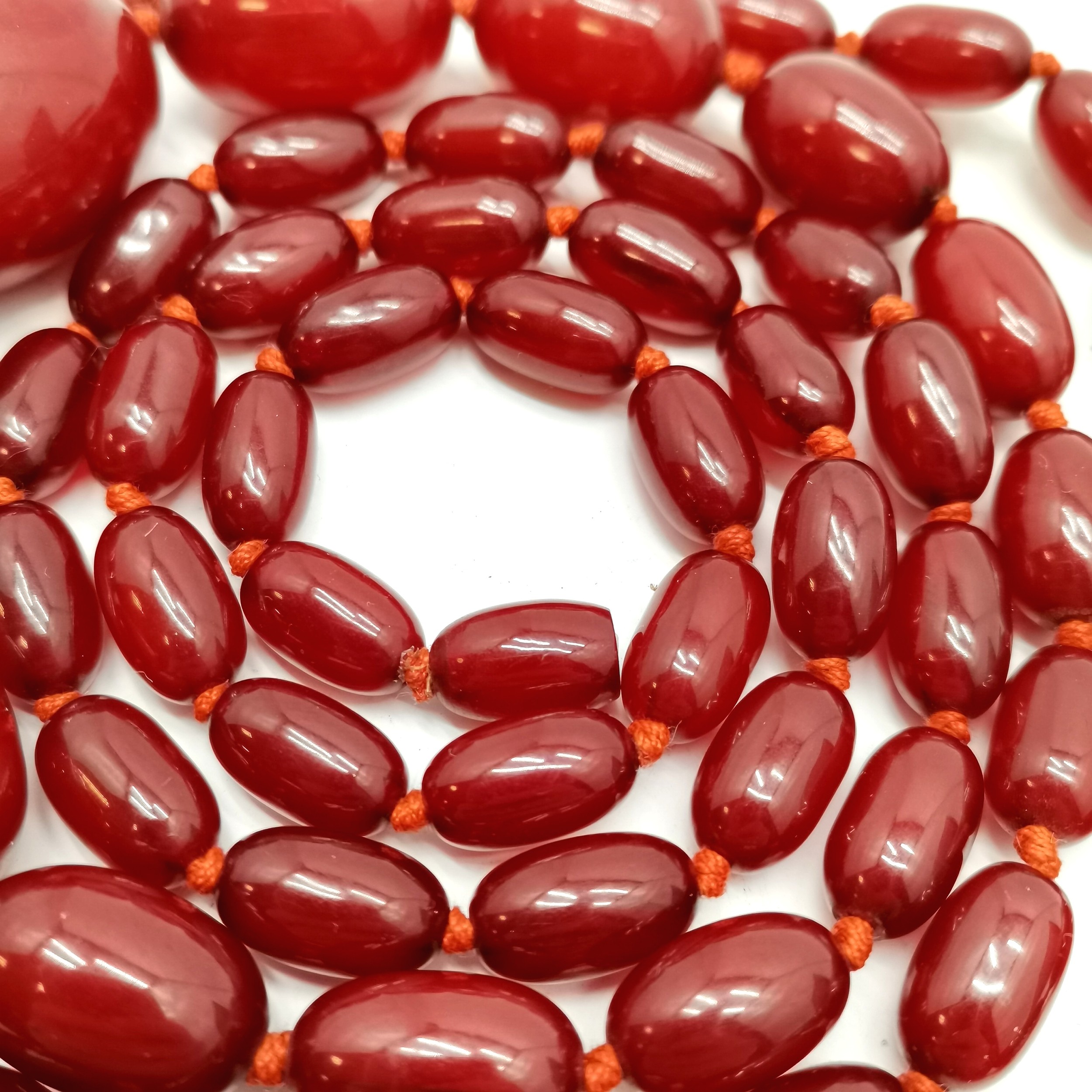 Long strand of cherry amber graduated beads - 110cm (largest bead 3cm) & 64g total weight ~ clasp - Image 2 of 4