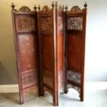 Vintage Indian teak 4 fold dressing screen or room divider, with brass inlay and carved fretwork