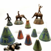 Quantity of studio pottery circus themed figures including 3 elephant figures 2 with riders and