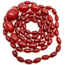Long strand of cherry amber graduated beads - 110cm (largest bead 3cm) & 64g total weight ~ clasp