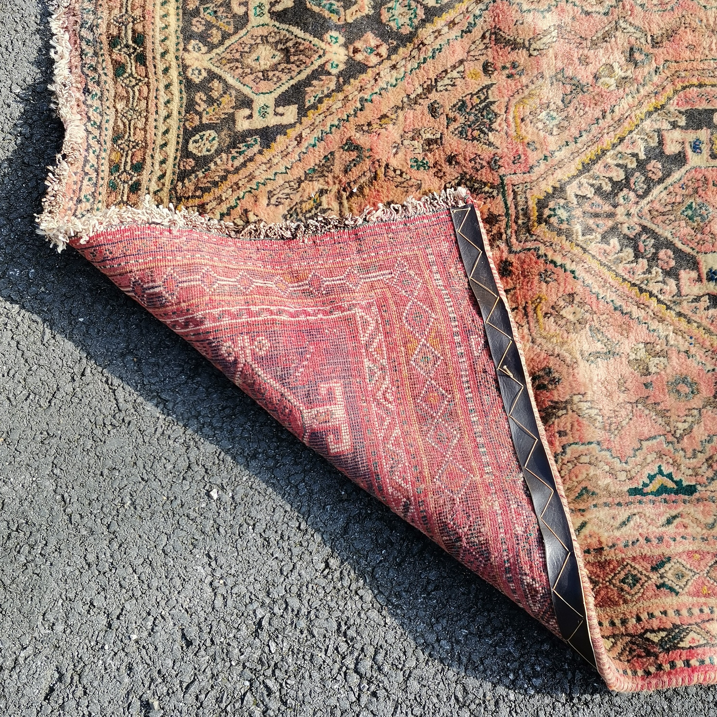 Pink wool grounded rug ~ 172cm x 118cm - no obvious signs of damage, slight creasings - Image 2 of 3