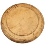 Antique hand carved bread board - 24.5cm diameter