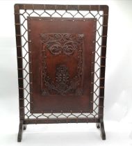 Liberty Arts & Crafts leather tooled fire screen attached to a wooden frame with leather stringing