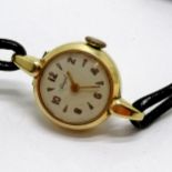 14ct gold cased manual wind ladies wristwatch (Royale) on a leather strap - total weight 9.8g
