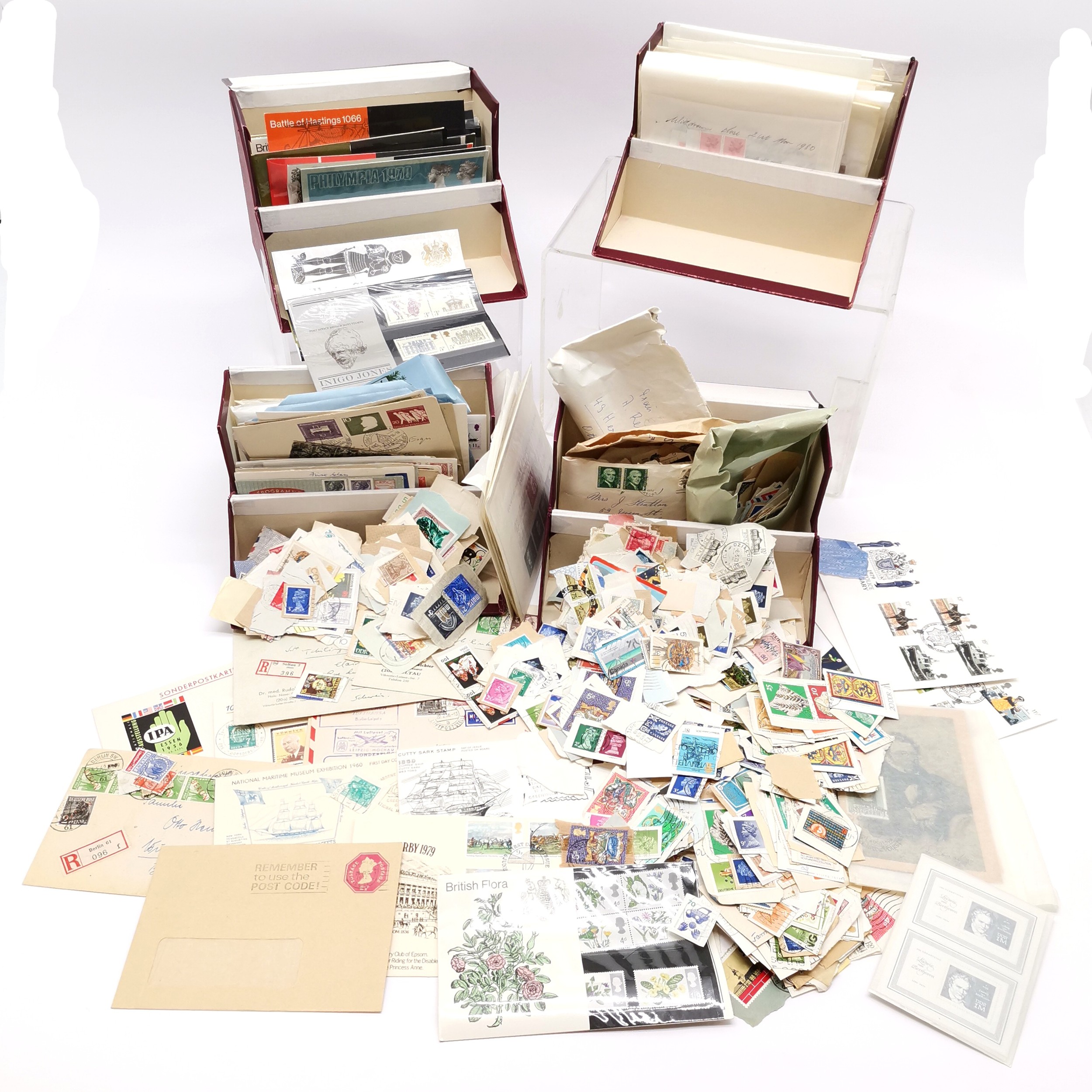 4 x red boxes containing selection of odd covers, stamps in packets, some German & UK blocks inc