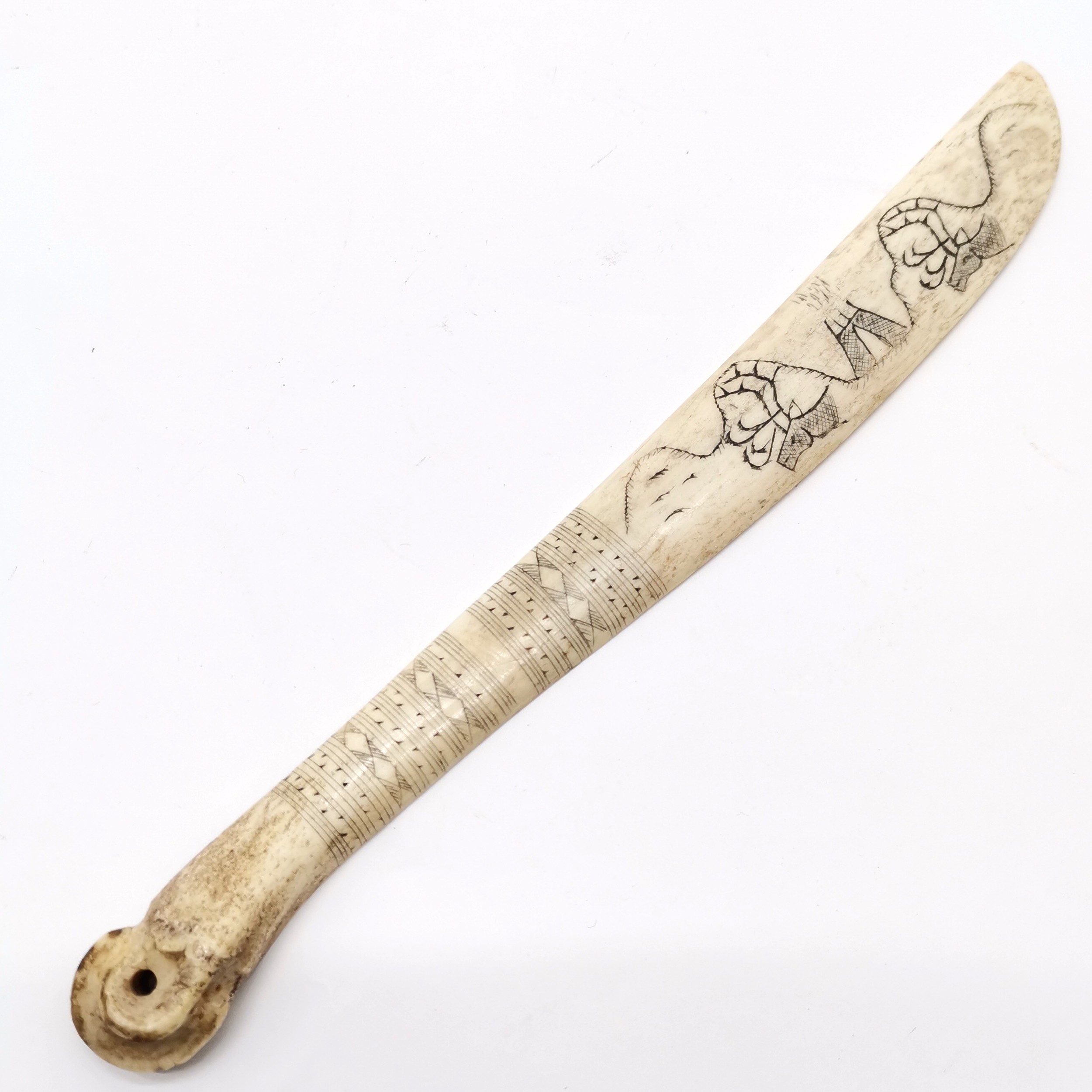 Inuit scrimshaw carved bone scraping knife with carabou & tent detail - 24cm long