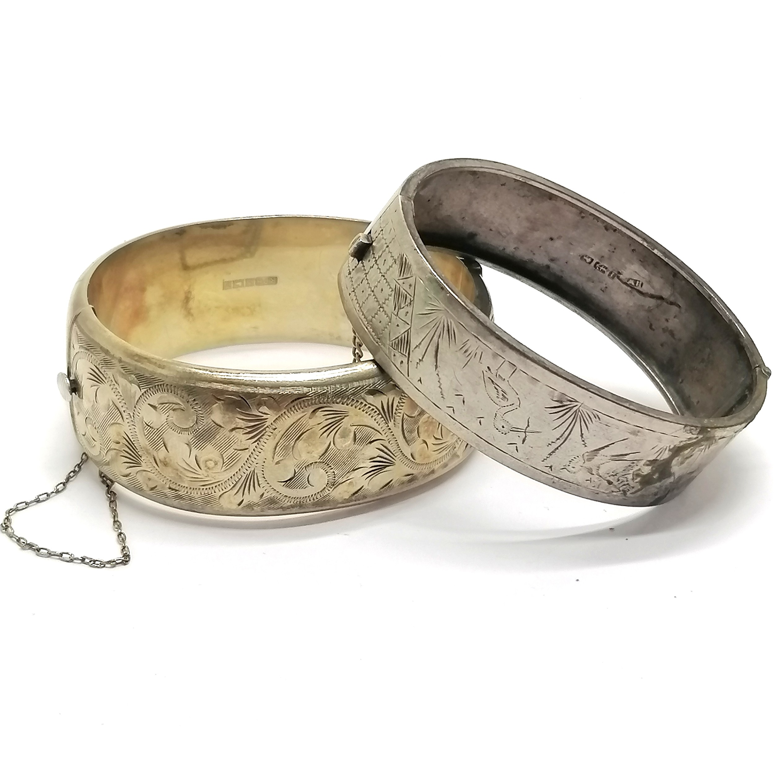 2 x silver bangles - 1 antique with bird detail (a/f), the other silver gilt - total weight (2) 59g
