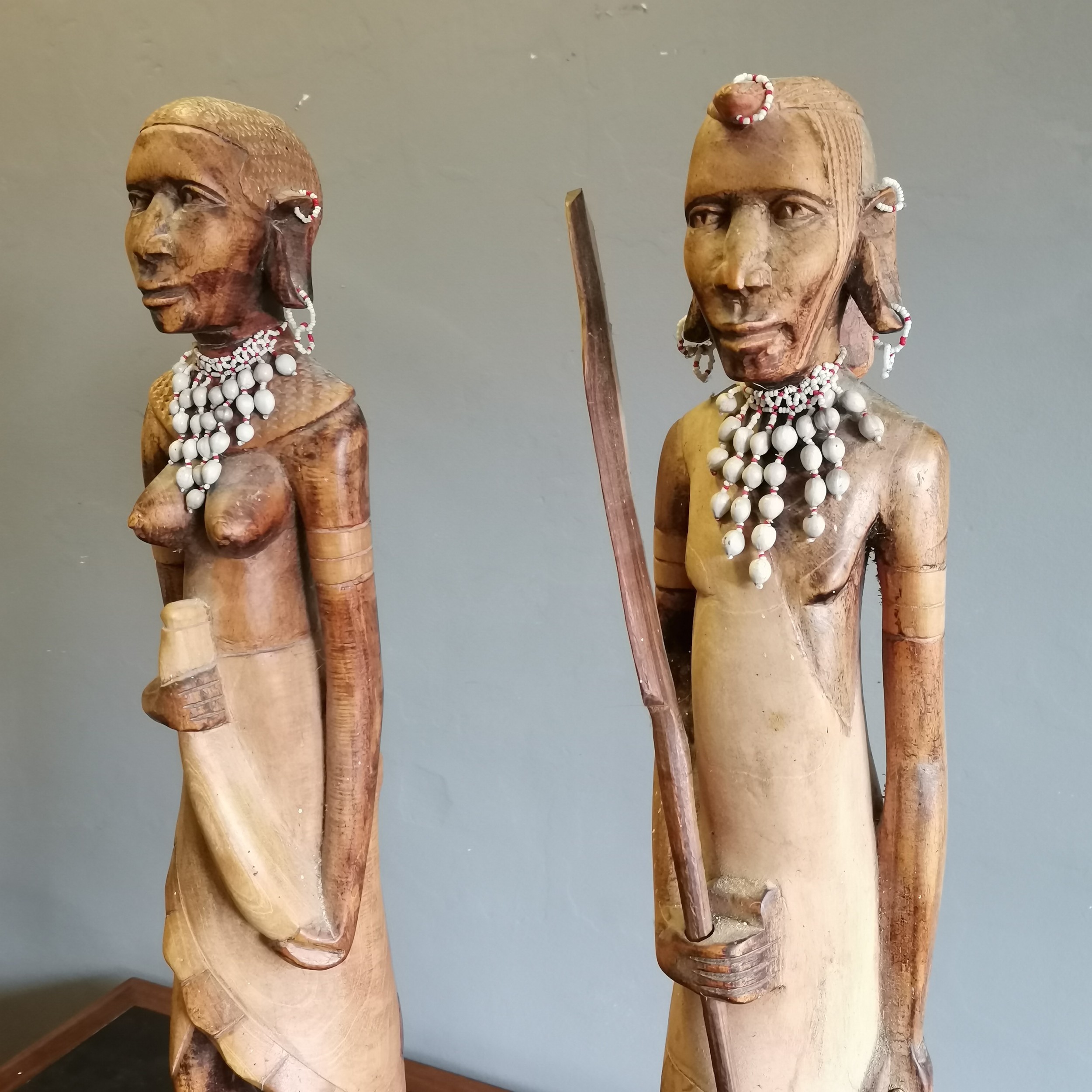 Pair of African Tribal hardwood figures male and female each with beaded and shell collars, The male - Image 3 of 3
