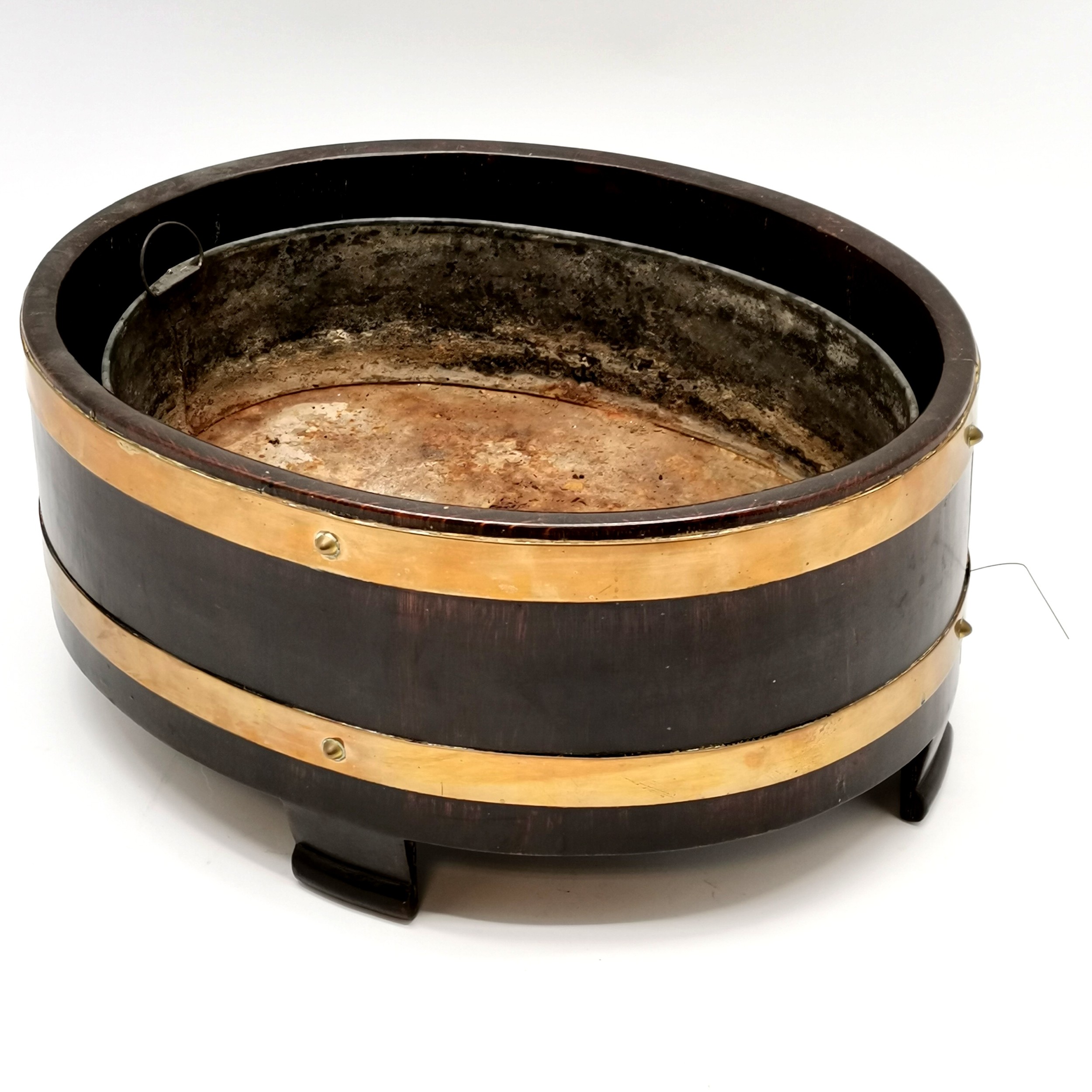 Antique oak coopered barrel jardiniere with brass banding and original zinc water tray, in good used