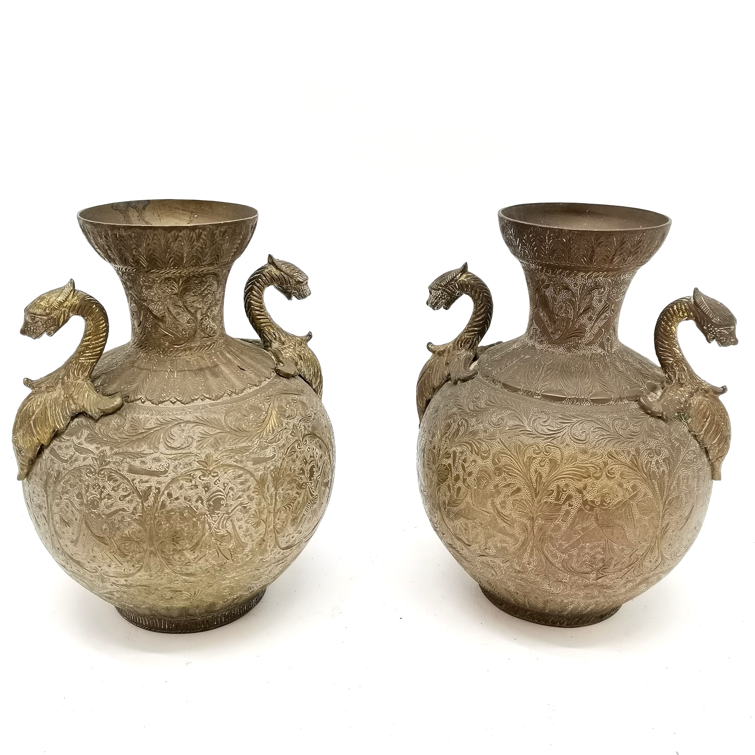 Indian pair of brass 2 handled vases - 21cm high with engraved detail of dancers to the bodies