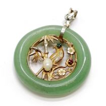 Hardstone jade pendant with inset bird panel with opal & red / green stone detail - 3.2cm diameter