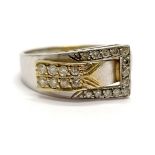18ct marked gold diamond set buckle design ring - size N & 4.4g total weight