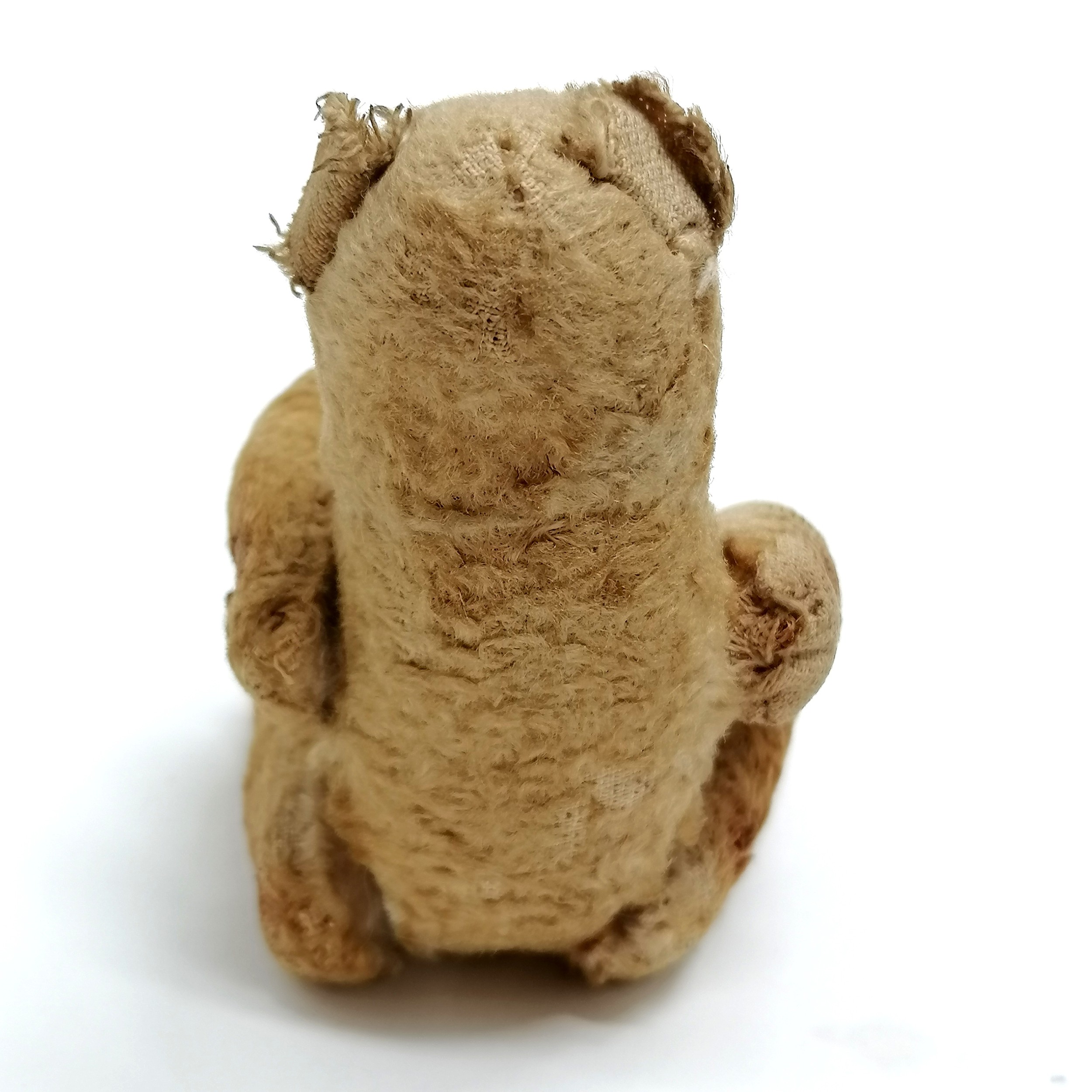 Antique jointed miniature mohair bear with metal button eyes - 13cm tall - in loveworn condition - Image 2 of 5