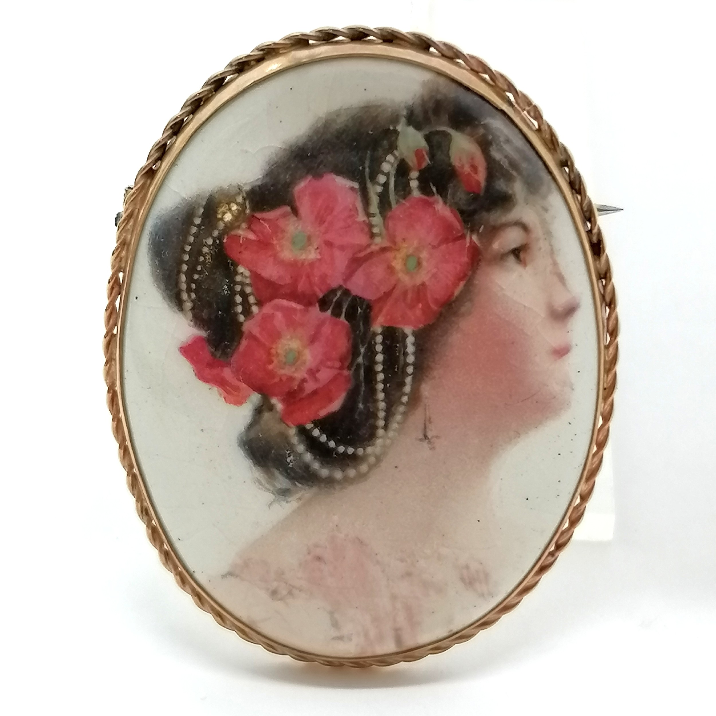 9ct marked gold mounted porcelain panel brooch of lady with flowers in her hair - 5cm drop & 17g