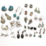 Qty of silver earrings (some unmarked) inc dolphin jumping through ring, koala bear etc - total