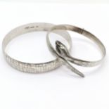 Silver hallmarked snake bangle with garnet eyes by Fred Manshaw Ltd t/w silver 7.5cm diameter bangle