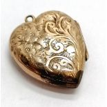 Unmarked 9ct gold heart shaped locket with engraved detail - 2cm drop & 2.3g and has dents