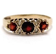 9ct hallmarked gold garnet / white stone set ring - size R & 1.9g total weight ~ garnets are worn