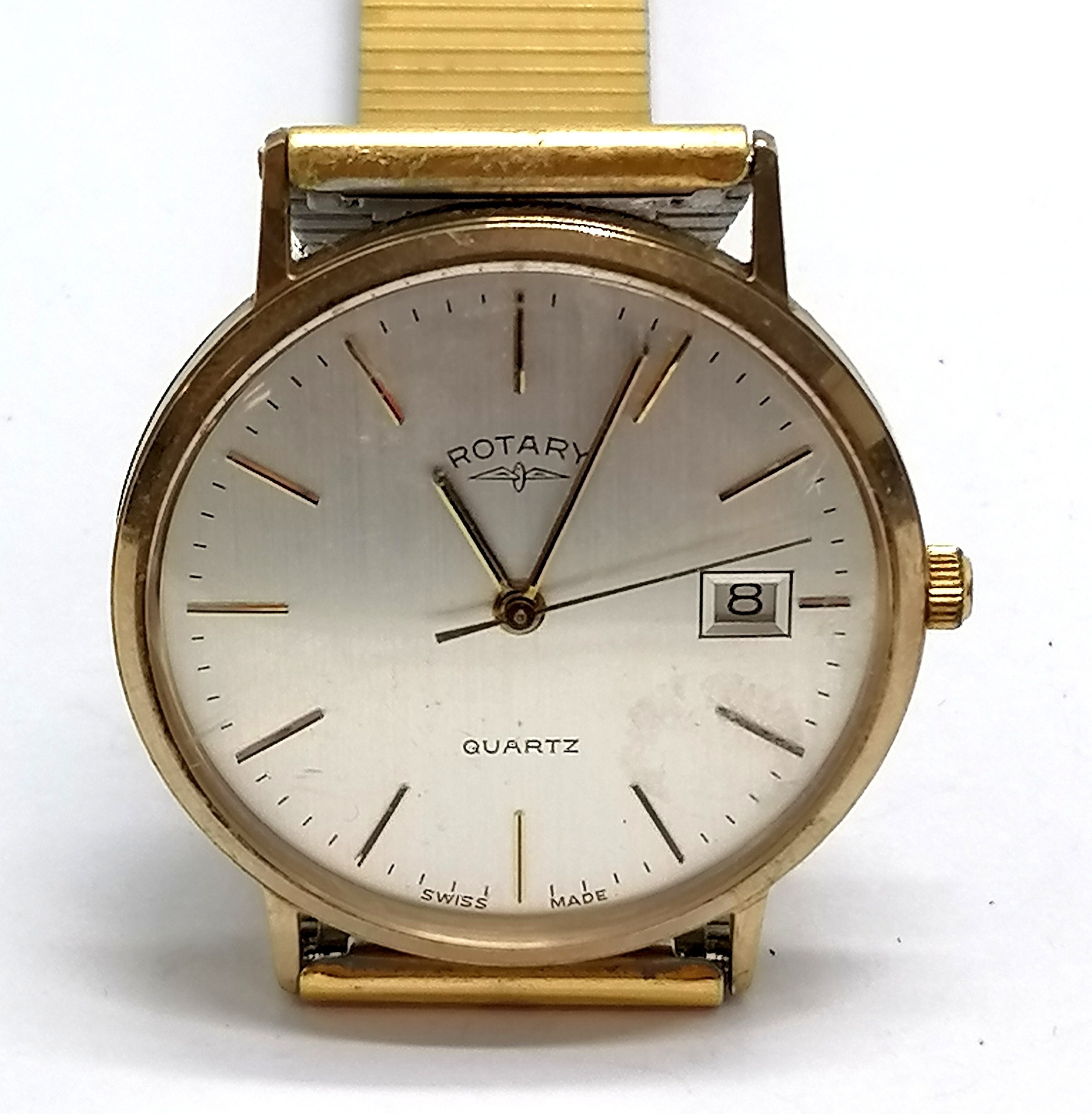 9ct gold cased Rotary gents quartz wristwatch (32mm case with dedication) on a gold plated strap