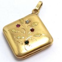 Antique unmarked (touch tests as 18ct) gold locket set with pearl / red & green stone - 3cm drop &