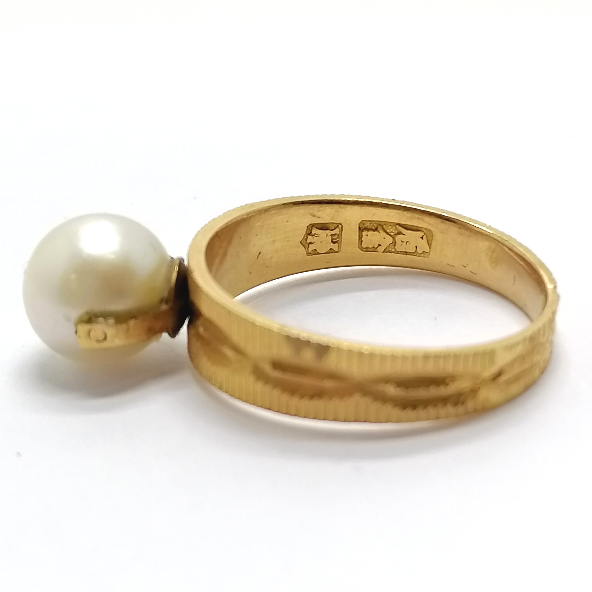 Chinese high carat gold (touch tests as 22ct) ring set with a pearl (8mm diameter) - the shank is - Image 3 of 5