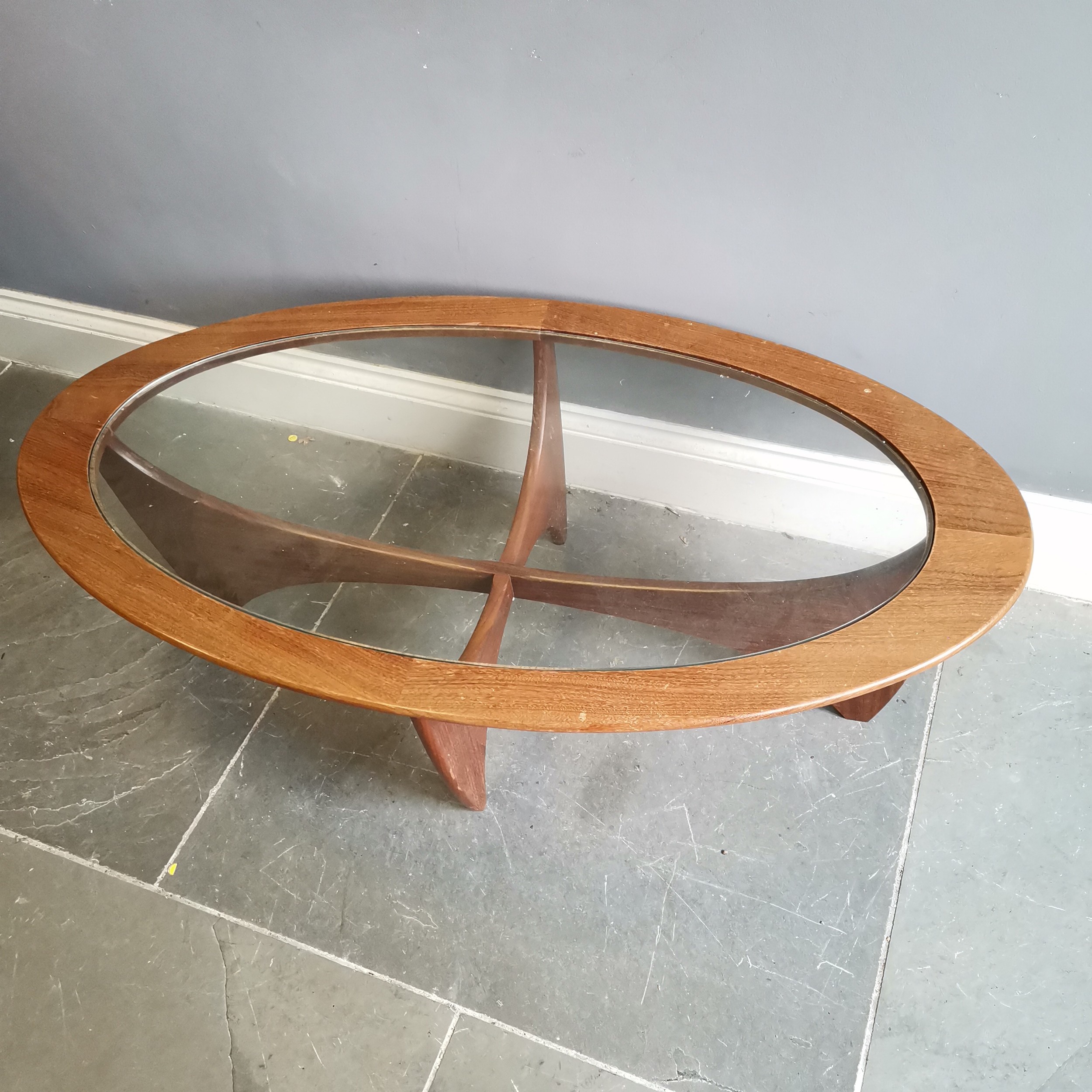 Mid century G Plan astro oval coffee table with inset glass top on stylized base by Victor Wilkins - Image 2 of 4