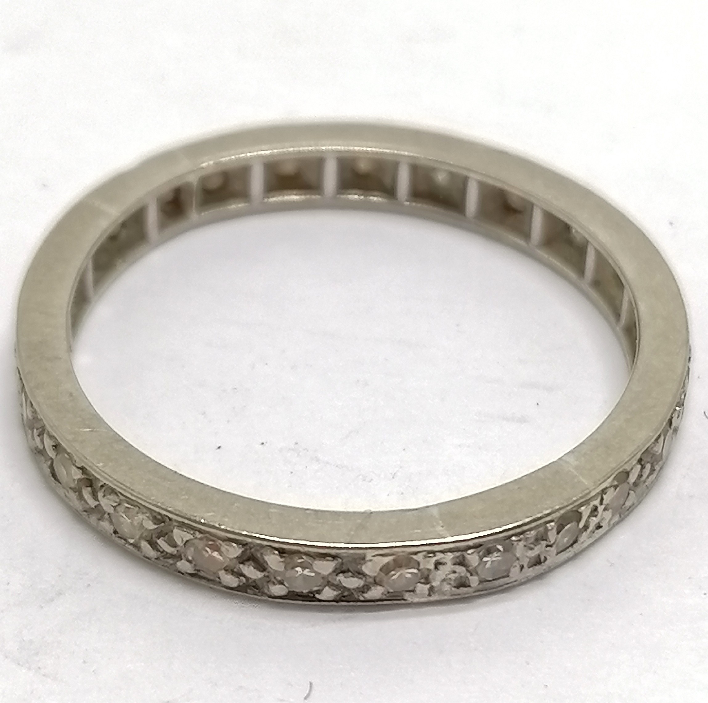 Unmarked white gold (touch tests as higher carat) diamond set eternity ring - size P & 3.2g total - Image 2 of 2