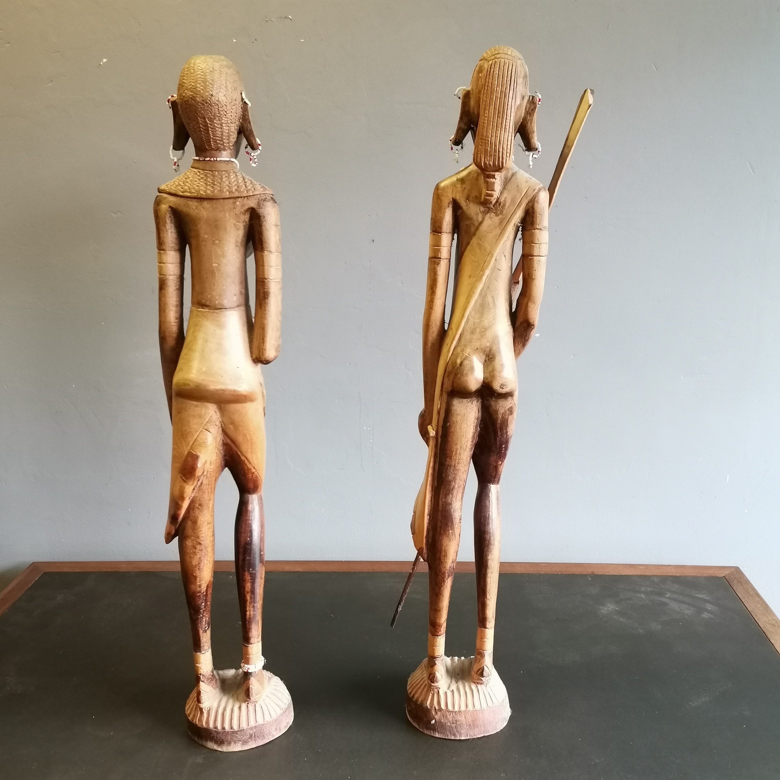 Pair of African Tribal hardwood figures male and female each with beaded and shell collars, The male - Image 2 of 3