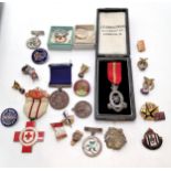 Qty of badges / medallions etc inc Territorial force nursing service cape badge (in J R Gaunt