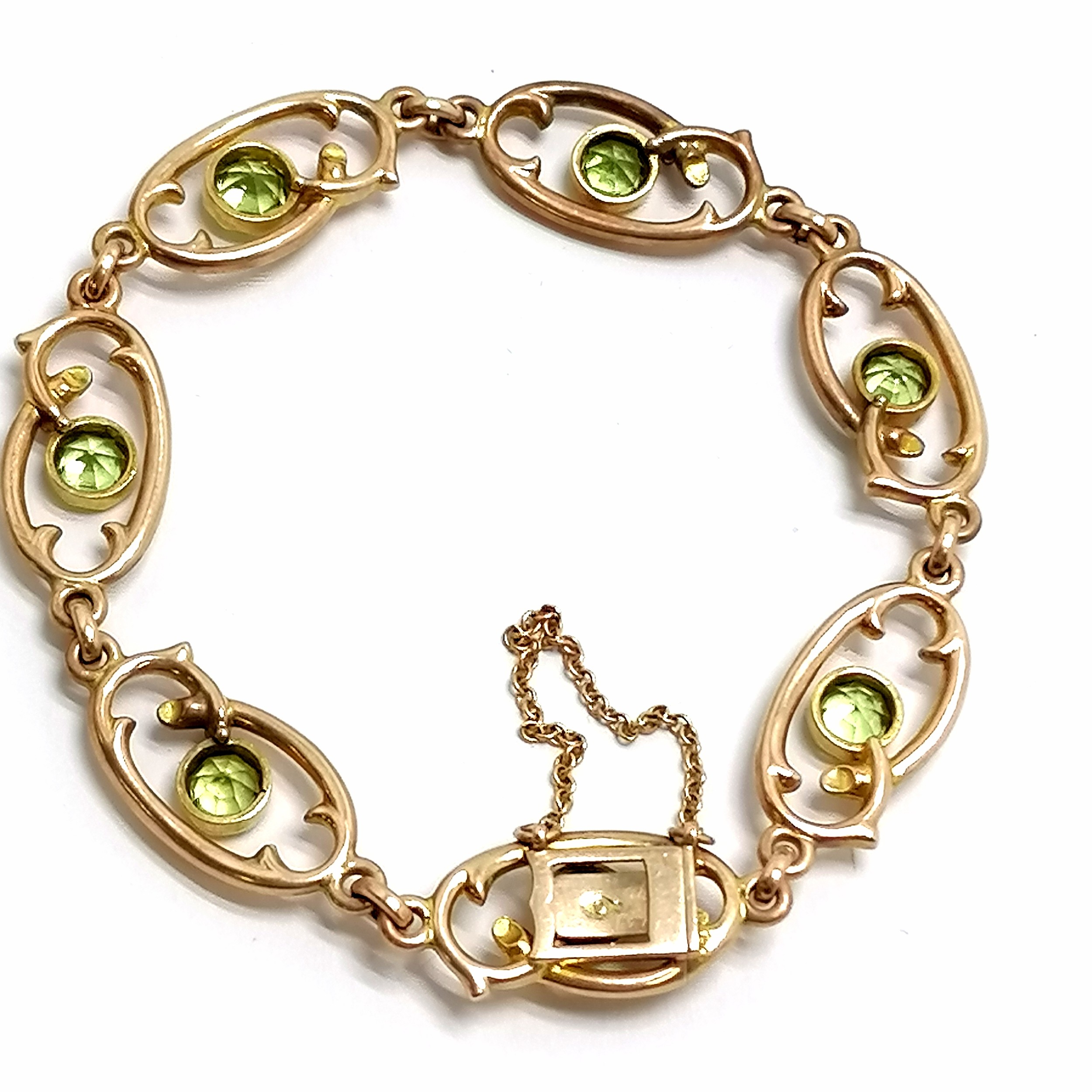 Antique Art Nouveau 9ct marked gold bracelet set with peridot in an original F Horstmann (Guildford) - Image 2 of 5