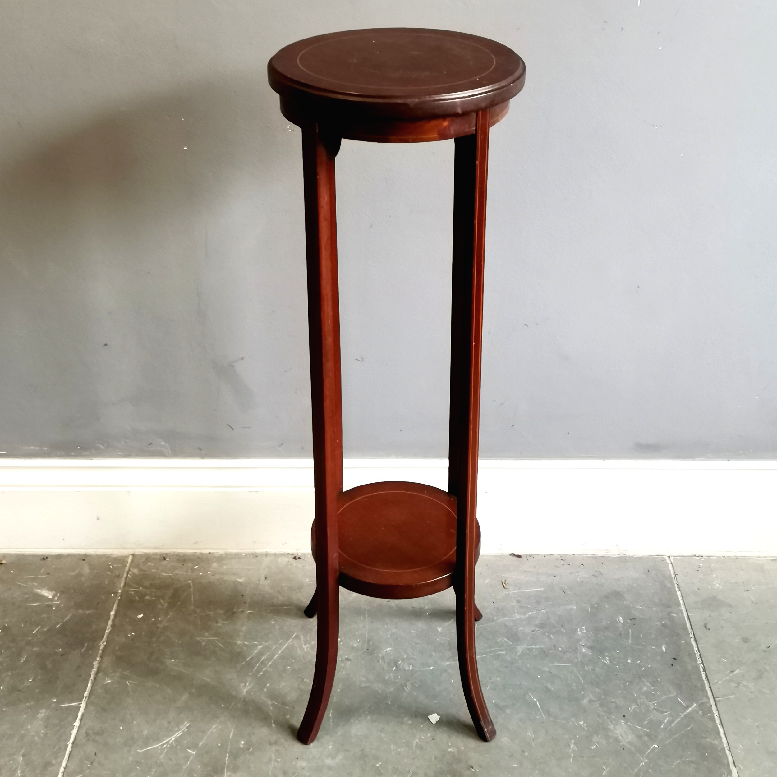 Edwardian 2 tier mahogany and satinwood string inlay circular plant stand on splayed supports,