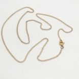 9ct (indistinctly marked) gold fine 48cm chain - 1.3g - old repair to connecting ring