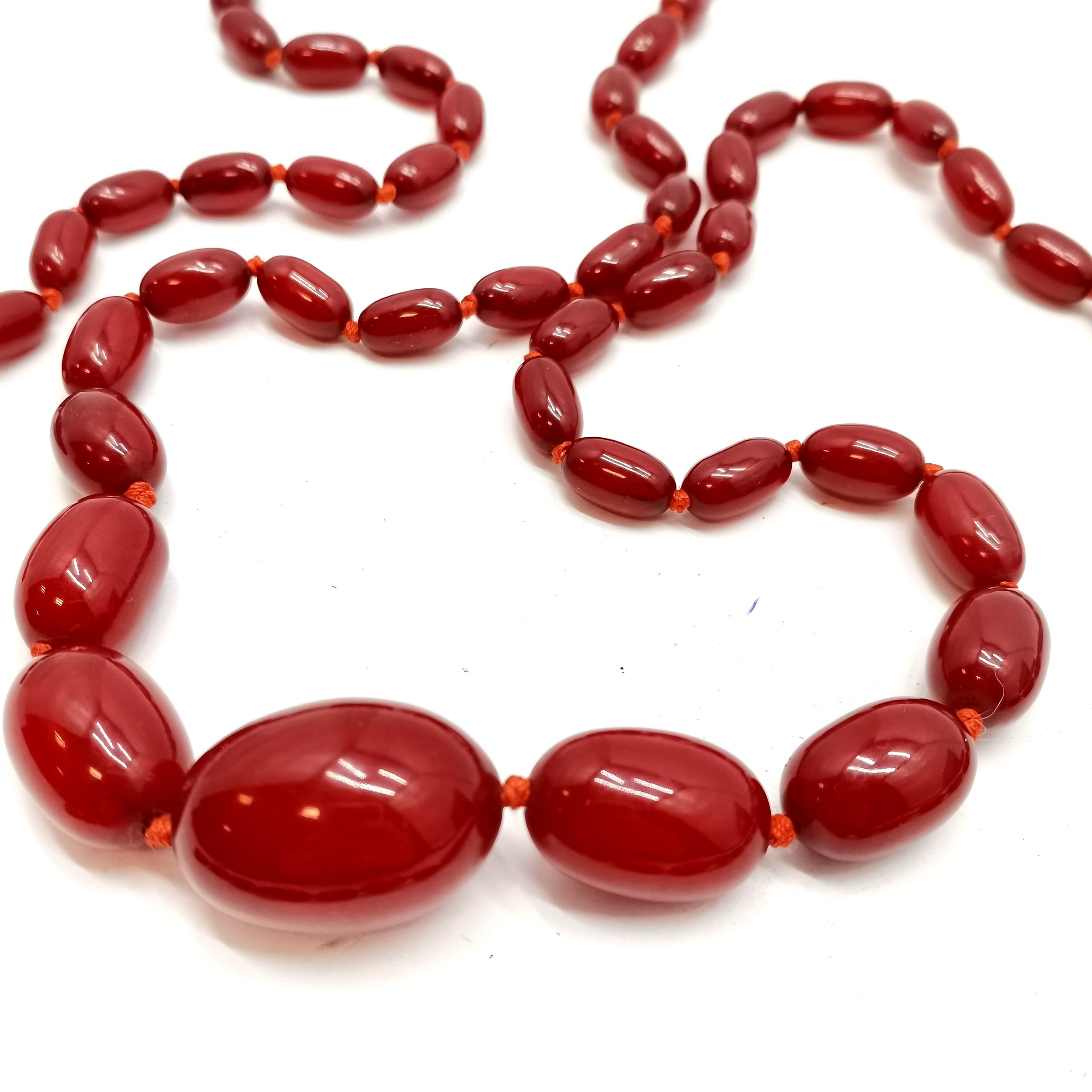 Long strand of cherry amber graduated beads - 110cm (largest bead 3cm) & 64g total weight ~ clasp - Image 4 of 4