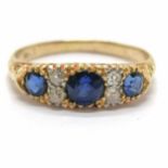 Antique 18ct marked gold sapphire (3) & diamond (4) ring - size M & 2.8g total weight