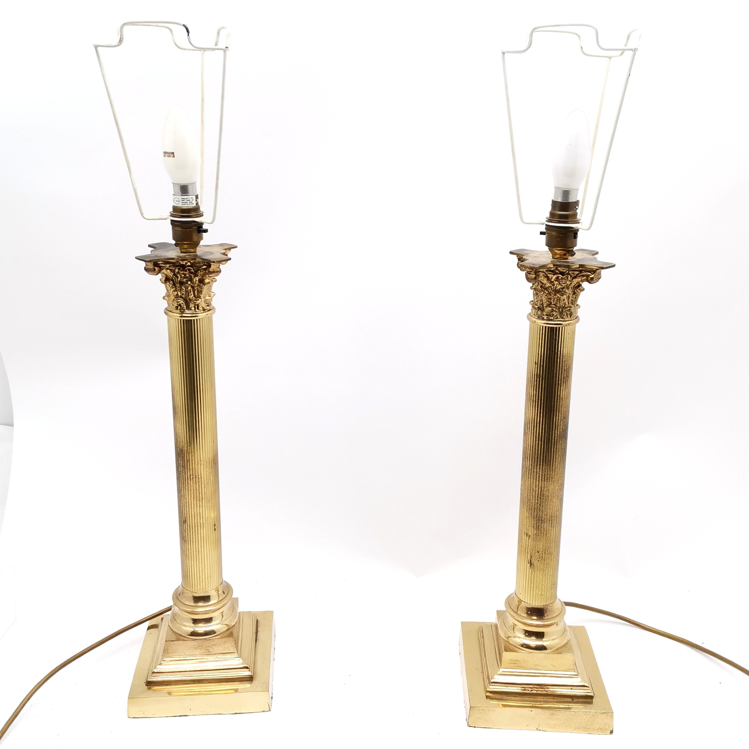 Tall pair of brass corinthian column lamps with pair of shot silk gold coloured shades - 74cm