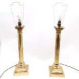Tall pair of brass corinthian column lamps with pair of shot silk gold coloured shades - 74cm
