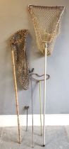Vintage adjustable fish landing net, on bamboo handle, 135cm length, another, t/w 3 rod rests. all
