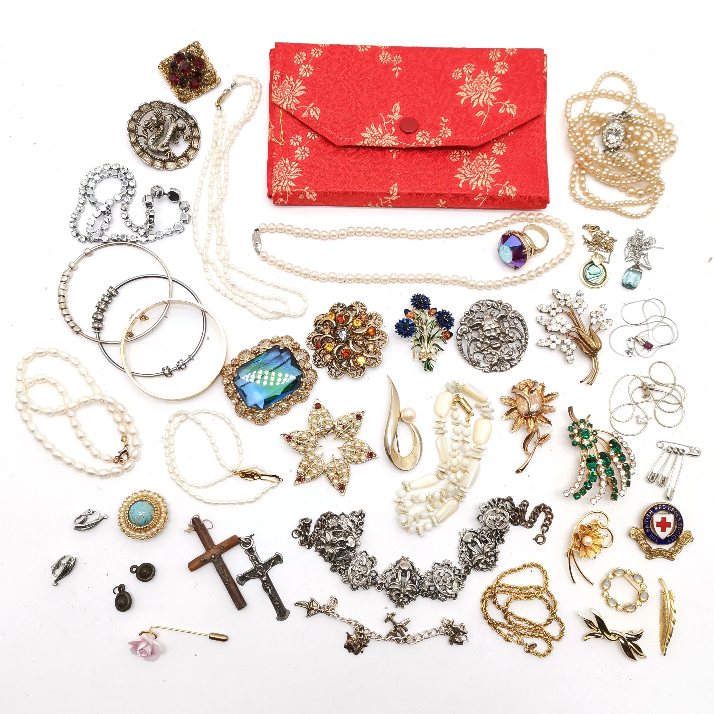 Qty of costume jewellery inc brooches, Red Cross badge, Monet gold tone necklace, Peter Sheung pouch