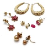 3 pairs of 9ct gold earrings (2 set with ruby - 1 pair a/f) t/w 2 odd earrings ~ total weight 3.9g -