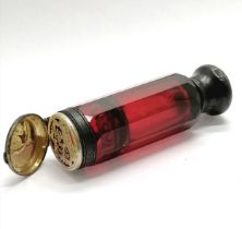 Antique cranberry cut glass double ended scent bottle / vinaigrette with unmarkd silver fittings -