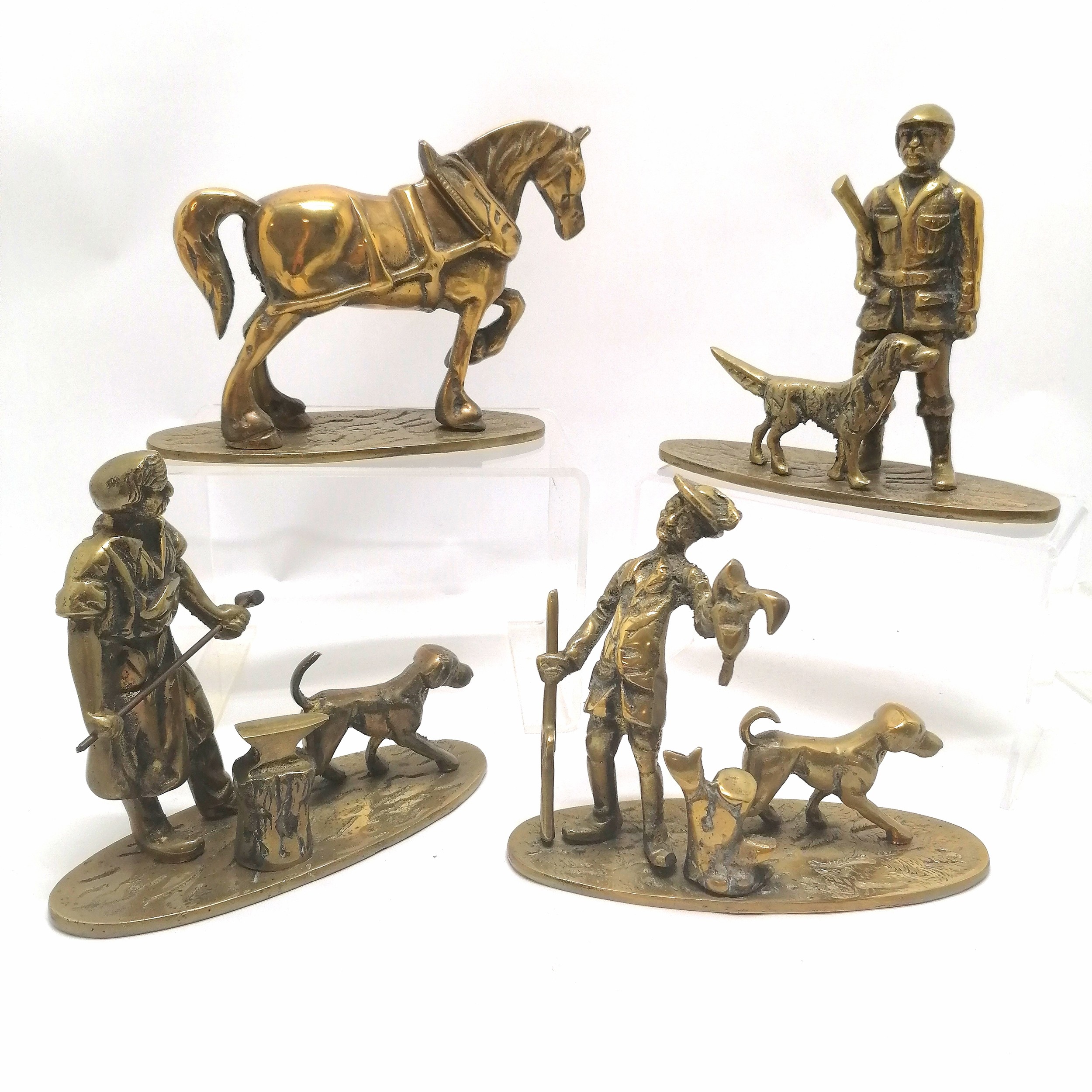 Brass shire horse, hunter with dog, blacksmith and gentleman with a dog all on oval brass bases
