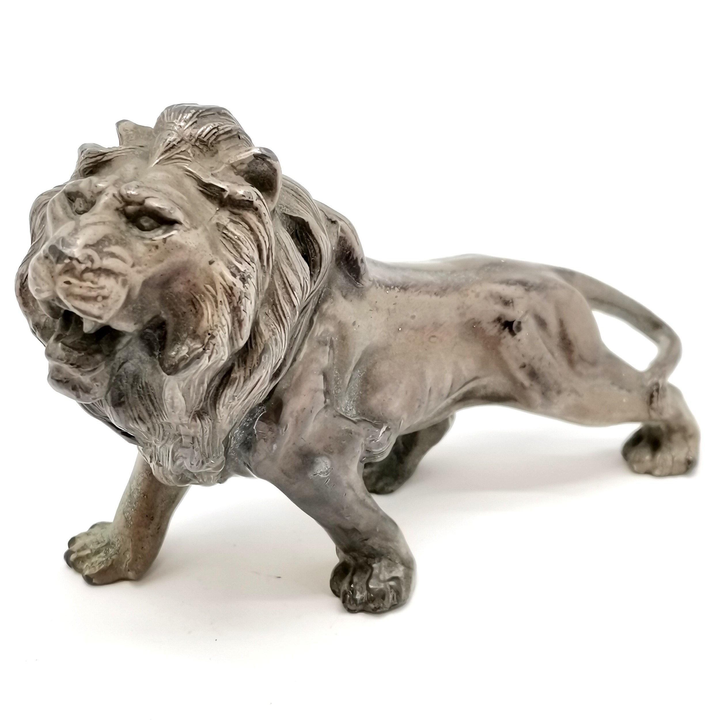 Antique cast metal figure of a male lion - 12cm across x 9cm high